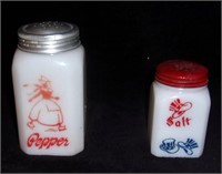 Vintage milk glass odd salt & pepper shakers.