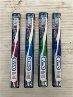 Oral-B 4 packs of toothbrushes multicolor