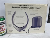 Sharper image design personal warm+cool system