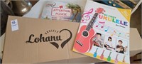 Lohanu Ukule in box w/ accessories & book