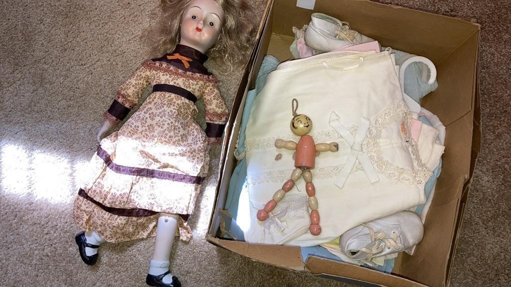 Vintage baby clothes, doll