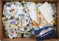 Box of Loose postmarked stamps taken off