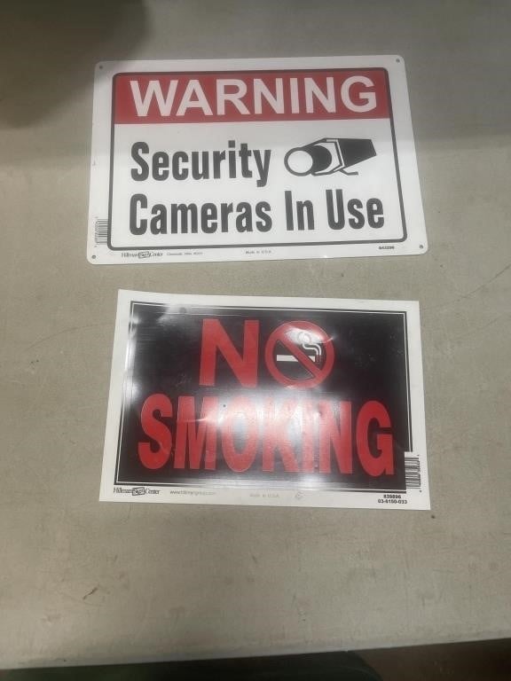 2 signs warning and no smoking