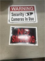 2 signs warning and no smoking