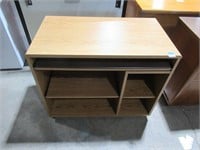 desk with storage and pullout keyboard table