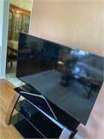 flat screen Samsung television appears to be 54