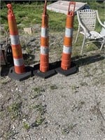 3 weighted orange cones