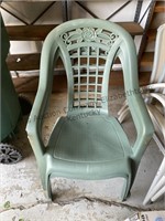 2 plastic green chairs