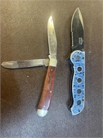 2 pocket knives MX customs and master ballistic