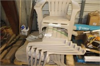 skid of plastic adirondack chairs