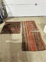 3 Mid size wool area rugs