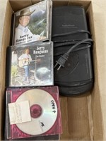 Assorted CDs and Video Cassette Rewinder