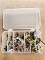 Assorted fishing flies and case