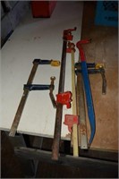 GROUP OF ASSORTED CLAMPS & WRECKING BAR