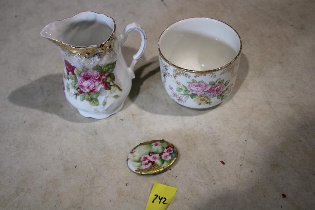 Brooch, pitcher, cup