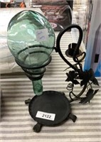 Cast-iron candle holder and wine decanter