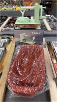 Tank, apple, peeler, and silicone mold