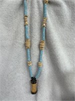 ANTIQUE NECKLACE WITH PALE BLUE SNAKE BEADS FROM