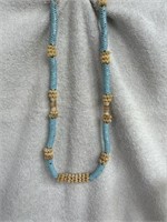 ANTIQUE NECKLACE WITH PALE BLUE SNAKE BEADS FROM
