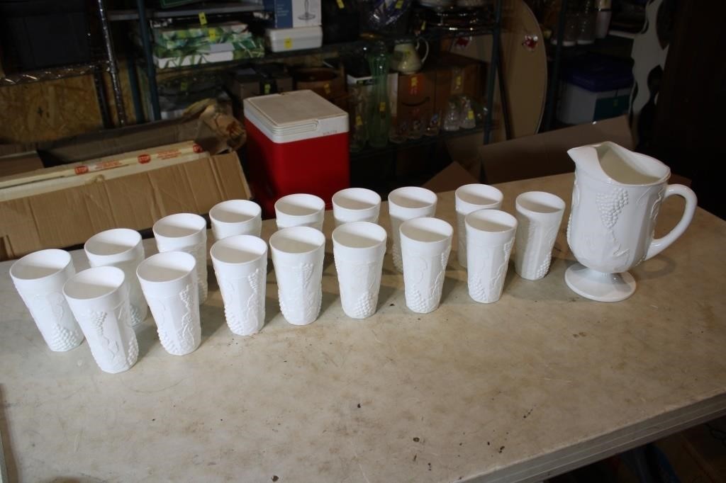 Milk glass pitcher and 16 glasses