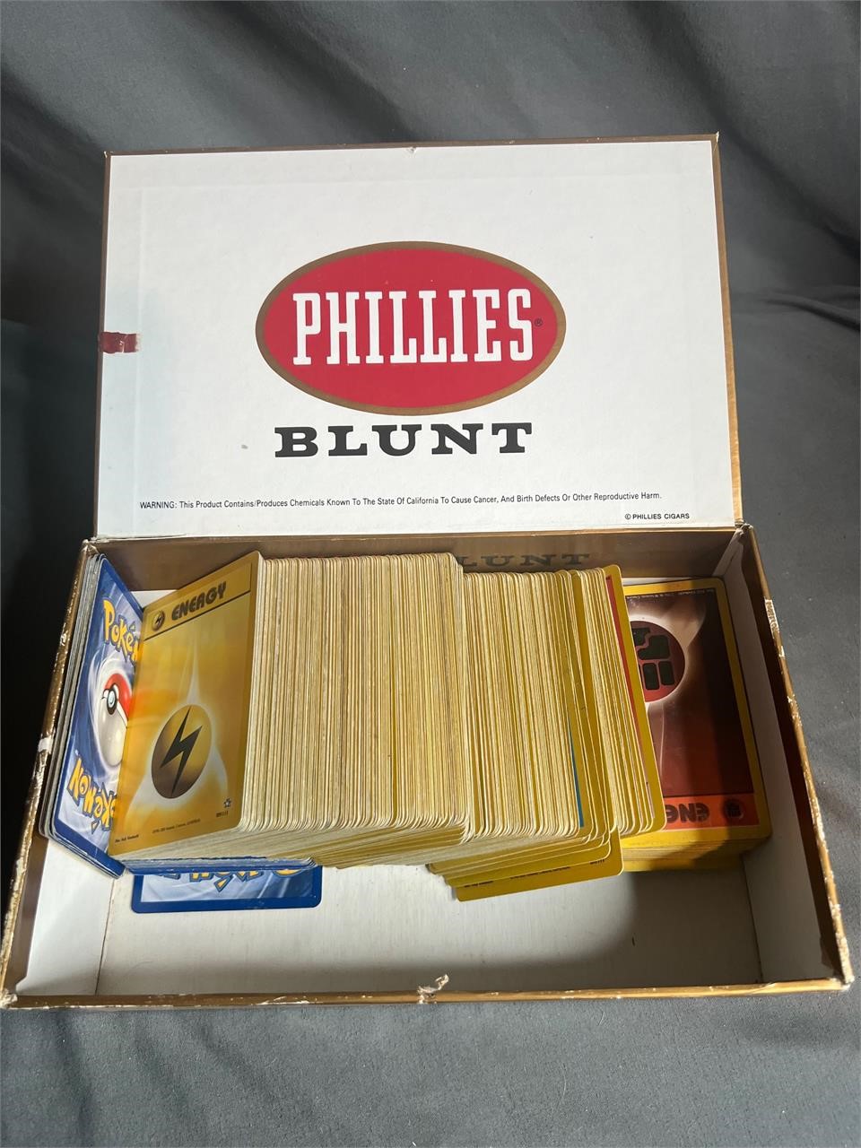 Cigar Box Full of Pokémon Energy Cards