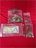Assortment of foreign currency coins and Canadian