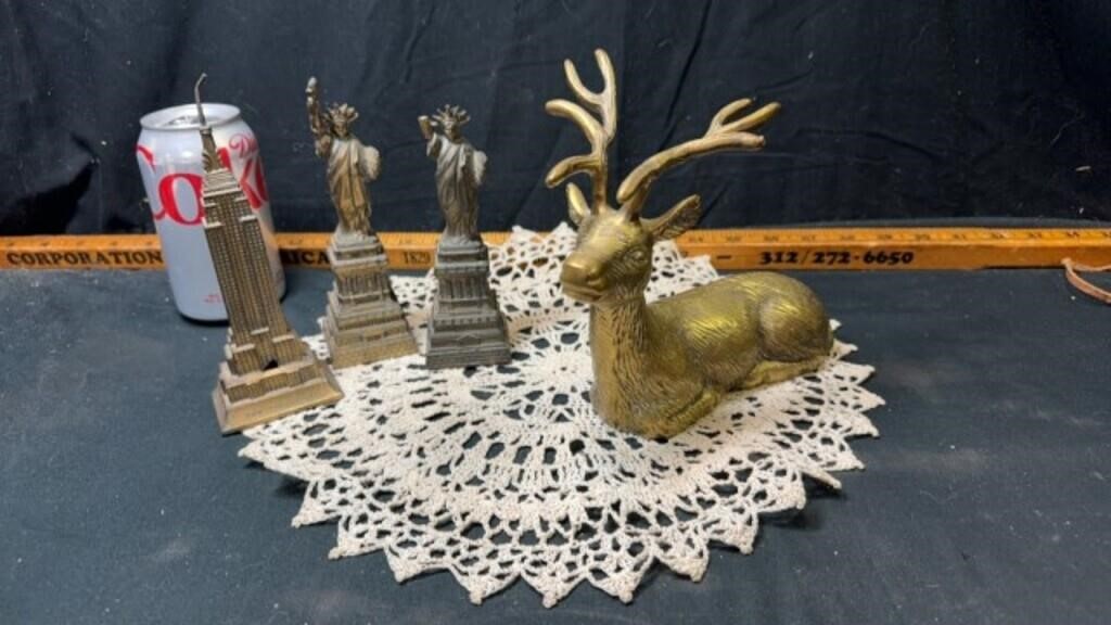 Brass deer and metal statues