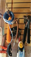 Wall of tools hammers clamp saw