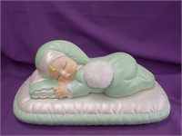 Ceramic sleeping baby