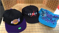 Jordan.  Lakers.  Hornets hats