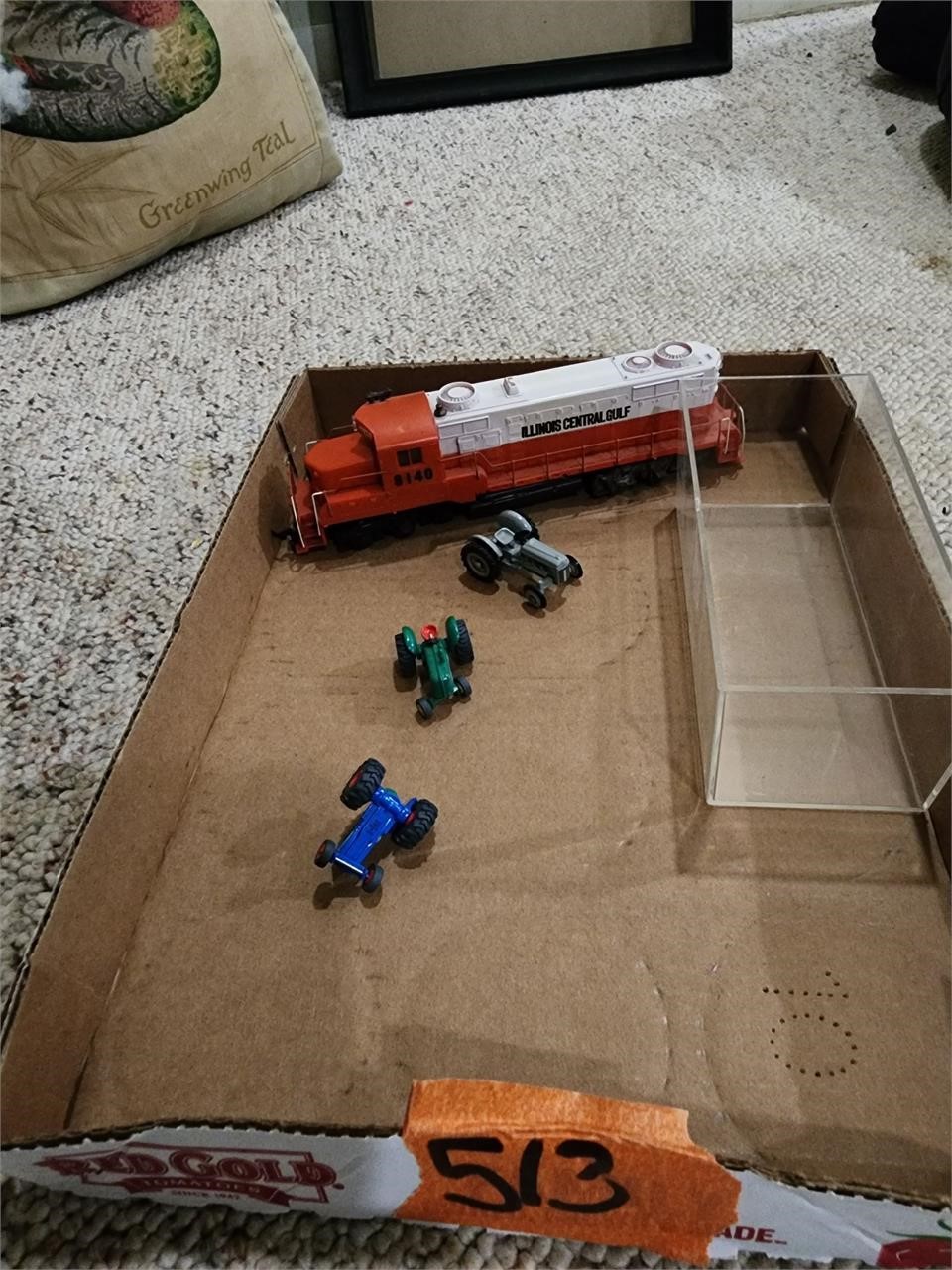 Metal toy train and tractors
