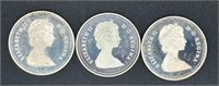 Three Canadian Silver Dollar Coins