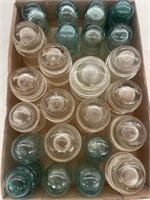 Lot of 24 glass insulators. Some small chips.