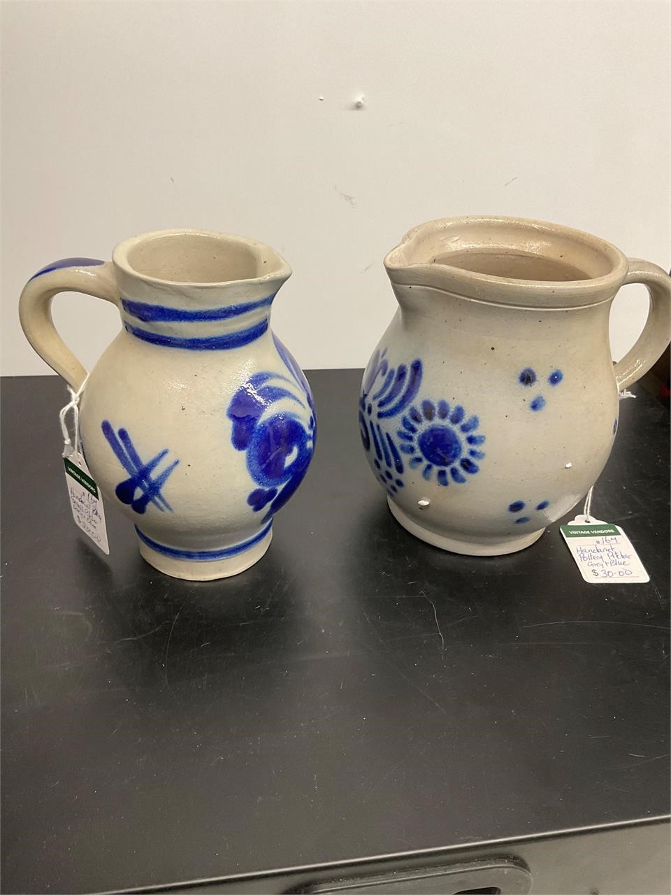 Pottery pitchers blue and grey