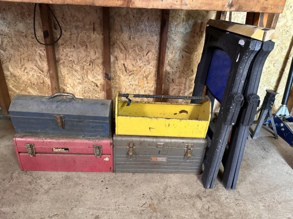 Four Metal Tool Boxes and Two Saw Horses