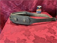 Antique leather horse collar with brass US buttons