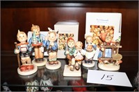 2nd shelf contents of curio cabinet; Hummels etc