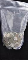 Bag of coins.mostly nickel's pennies and
