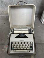 Vintage Olympia typewriter 15"w x 15”l