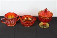 Assorted Pieces Red to Amber Glassware