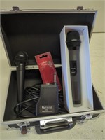 Pair of microphones in metal case. One wireless,