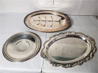Group of three silver plated serving trays