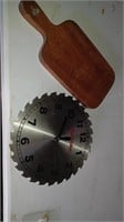 Wooden cutting board and True Value clock