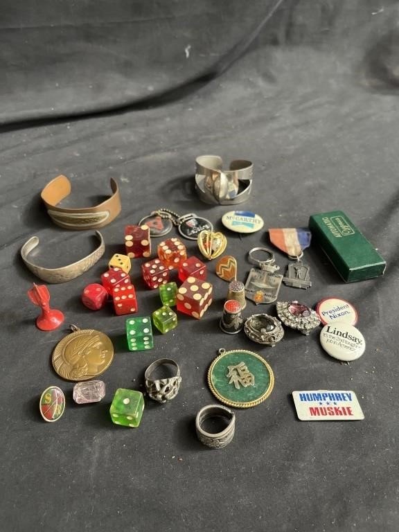 Bag of miscellaneous dice, pins, bracelets