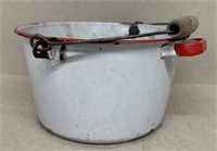 White and red enamel ware pan