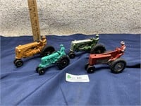 4 older toy tractors