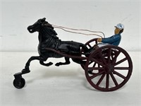 Antique cast iron horse racing toy 
5 1/2” h. X