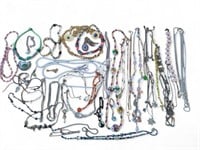 Large group of jewelry - necklaces. In bag, in