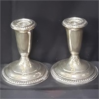 Pair of Sterling silver weighted candle sticks