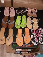 9 pair of size 8 women's sandals.